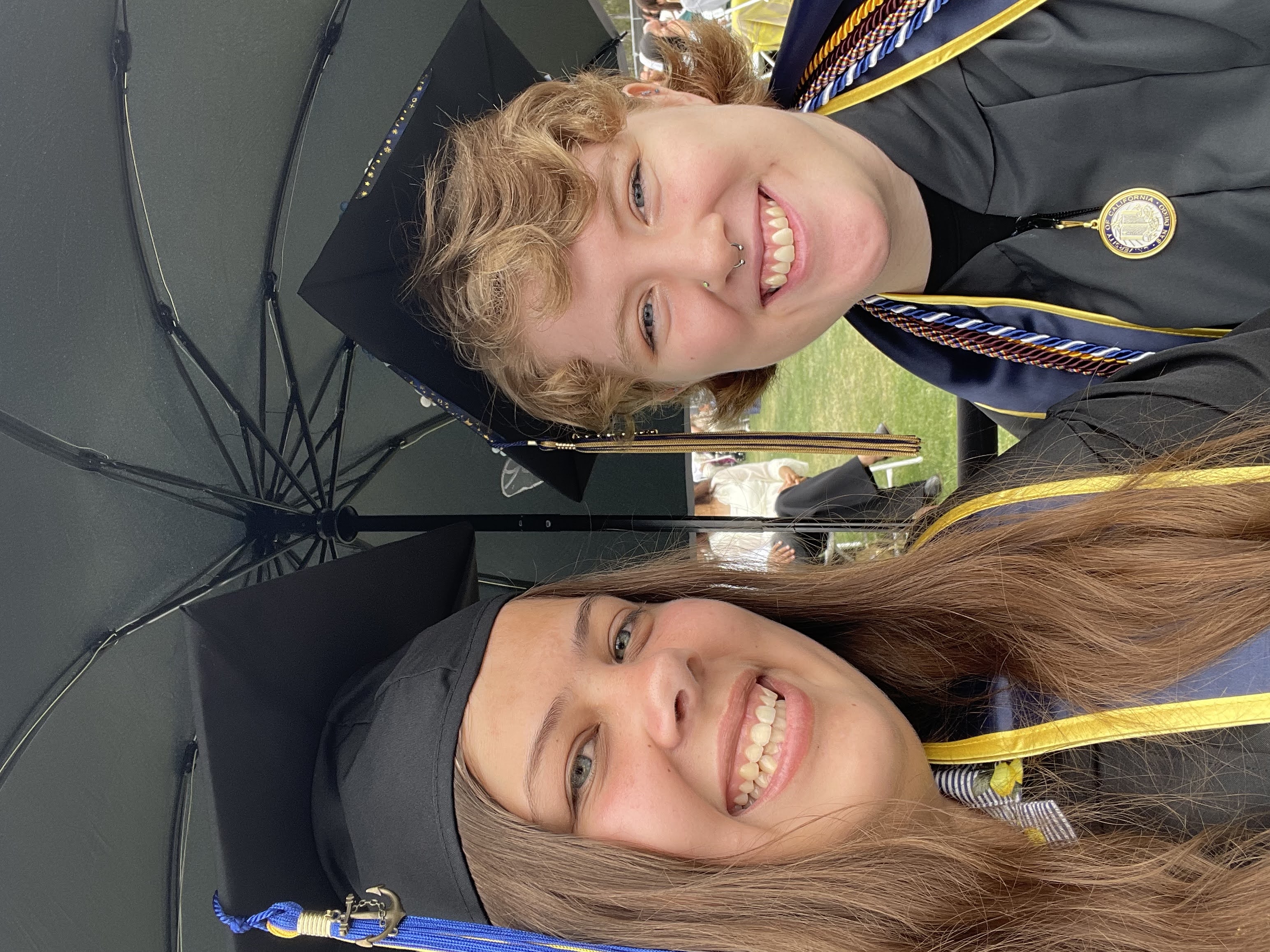 A graduation photo of me with my friend Dani at our graduation ceremony.